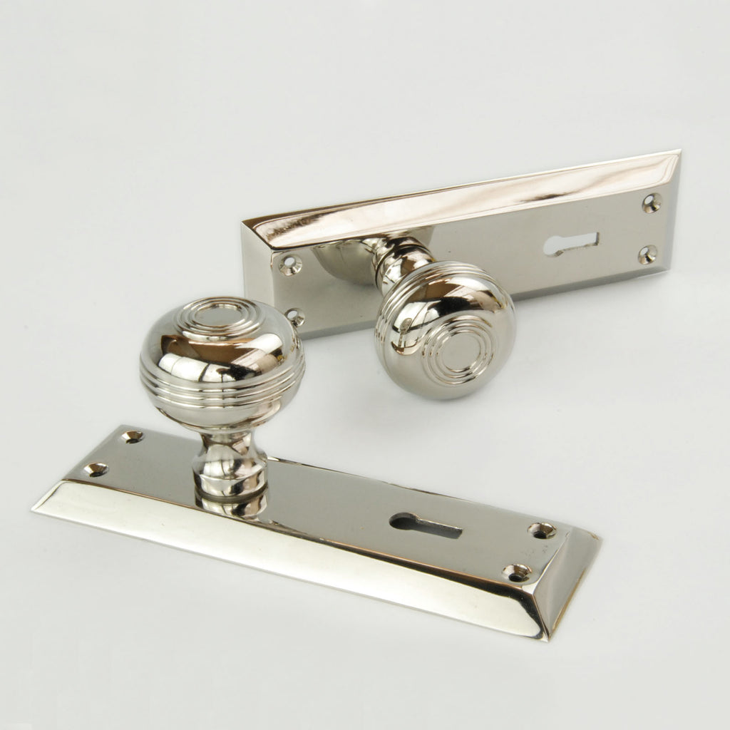 Bellport Polished Nickel Solid Brass Round Door Knobs on a Long Backplate