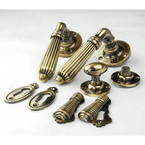 Vintage Regency Reeded Lever Door Handles - Antique Brass