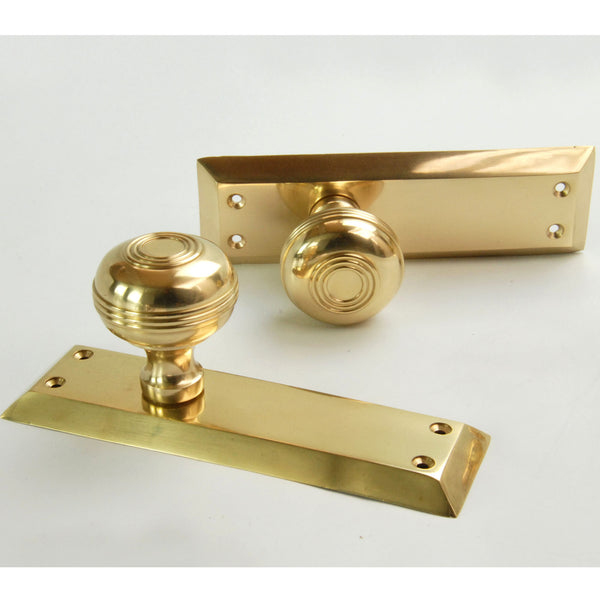 Bellport Polished Solid Brass Round Door Knobs on a Long Backplate