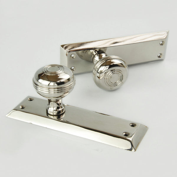 Bellport Polished Nickel Solid Brass Round Door Knobs on a Long Backplate