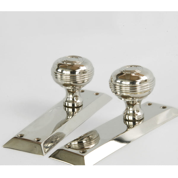 Bellport Polished Nickel Solid Brass Round Door Knobs on a Long Backplate
