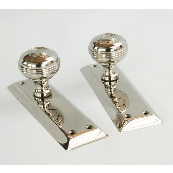 Bellport Polished Nickel Solid Brass Round Door Knobs on a Long Backplate