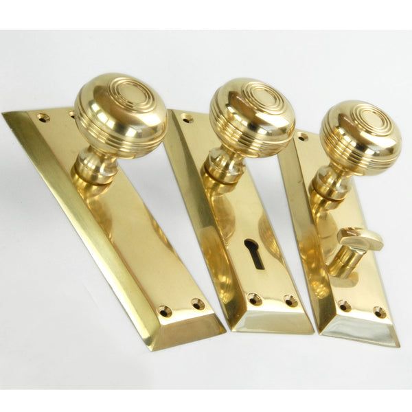 Bellport Polished Solid Brass Round Door Knobs on a Long Backplate