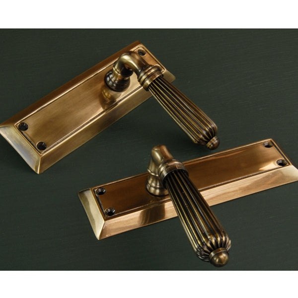 Antique Solid Brass Regency Reeded Lever Door Handles on Long Backplate