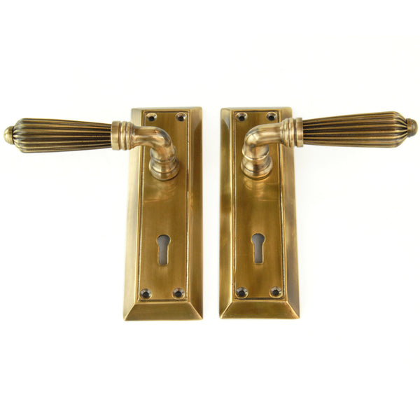 Antique Solid Brass Regency Reeded Lever Door Handles on Long Backplate