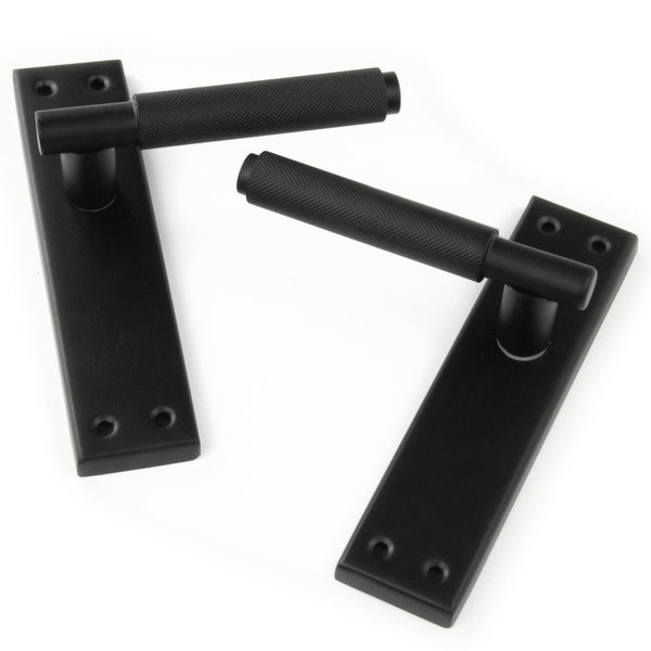 Satin Matt Black Knurled Door Lever Handles on a Long 7" Back Plate