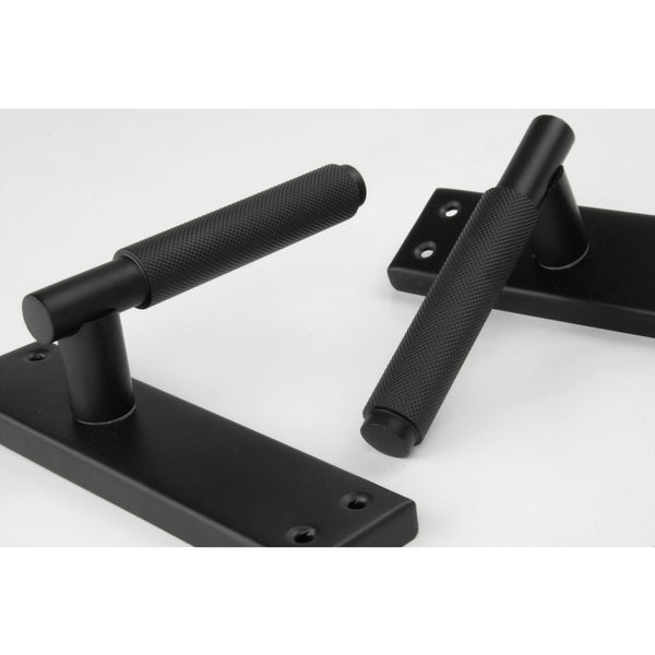 Satin Matt Black Knurled Door Lever Handles on a Long 7" Back Plate