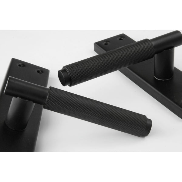 Satin Matt Black Knurled Door Lever Handles on a Long 7" Back Plate