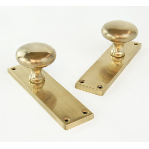 Aged Unlacquered Solid Brass New York Round Door Knobs Handles on Backplate