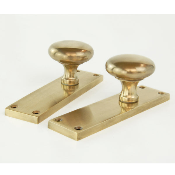 Aged Unlacquered Solid Brass New York Round Door Knobs Handles on Backplate