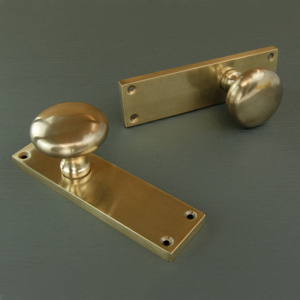 Aged Unlacquered Solid Brass New York Round Door Knobs Handles on Backplate