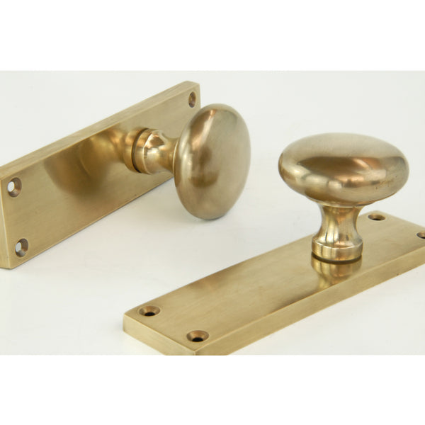 Aged Unlacquered Solid Brass New York Round Door Knobs Handles on Backplate