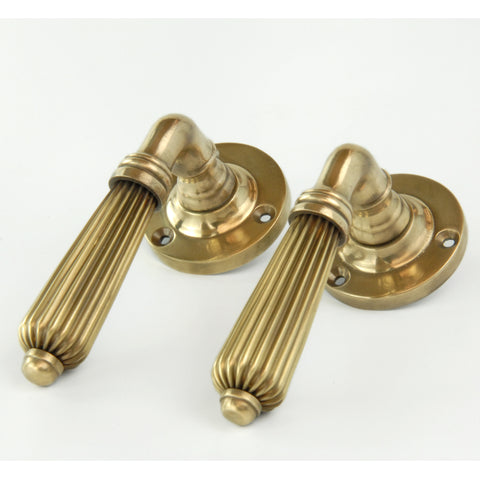 Aged Unlacquered Solid Brass Vintage Regency Reeded Lever Door Handles
