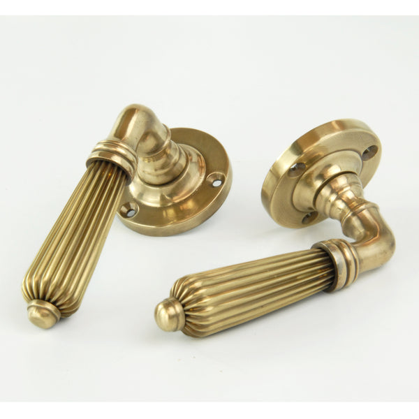 Aged Unlacquered Solid Brass Vintage Regency Reeded Lever Door Handles