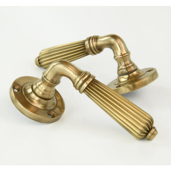 Aged Unlacquered Solid Brass Vintage Regency Reeded Lever Door Handles