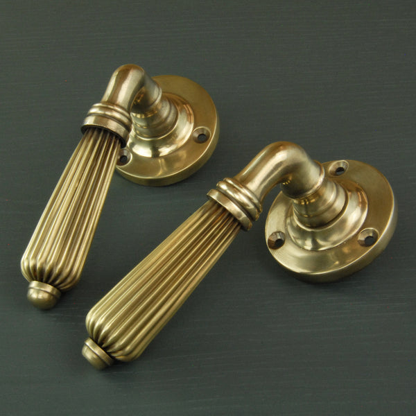 Aged Unlacquered Solid Brass Vintage Regency Reeded Lever Door Handles