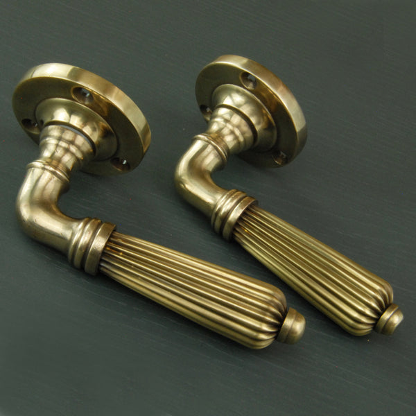 Aged Unlacquered Solid Brass Vintage Regency Reeded Lever Door Handles
