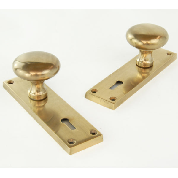 Aged Unlacquered Solid Brass New York Round Door Knobs Handles on Backplate