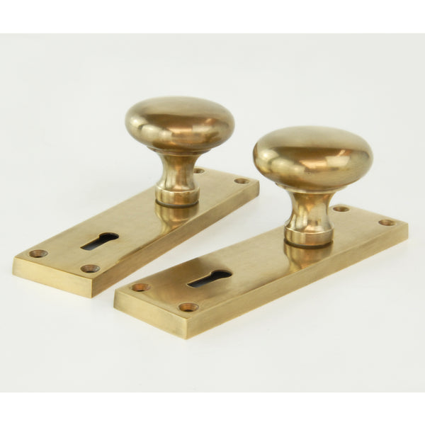 Aged Unlacquered Solid Brass New York Round Door Knobs Handles on Backplate