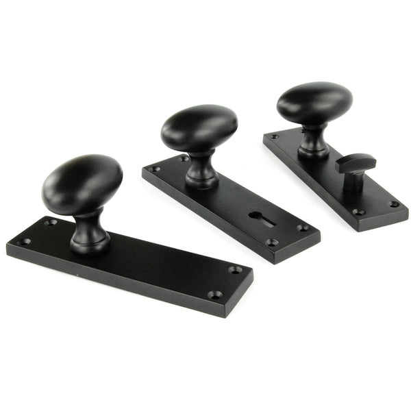 New York Door Knobs Oval Round Handles on Backplate Satin Black