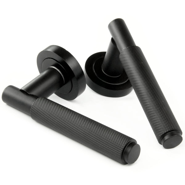 Satin Matt Black Knurled Door Lever Handles on a Round Rose
