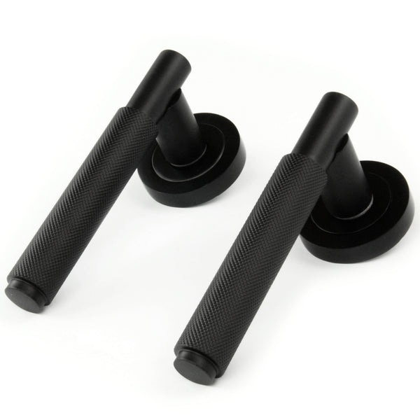 Satin Matt Black Knurled Door Lever Handles on a Round Rose