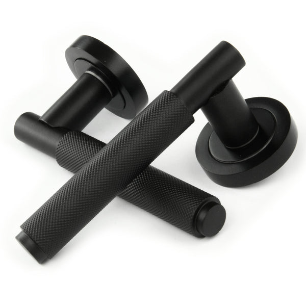 Satin Matt Black Knurled Door Lever Handles on a Round Rose
