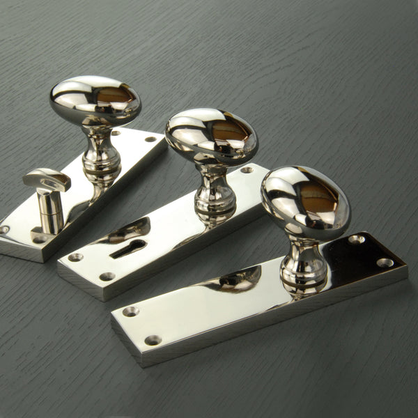 New York Door Knobs Oval Round Handles on Backplate Polished Nickel