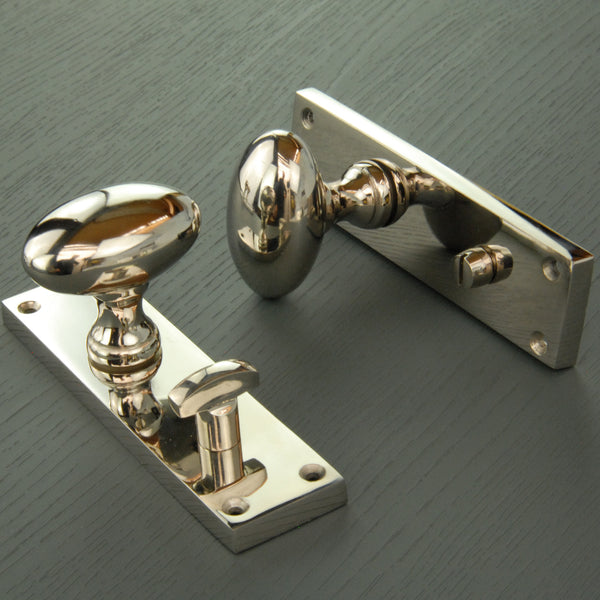New York Door Knobs Oval Round Handles on Backplate Polished Nickel