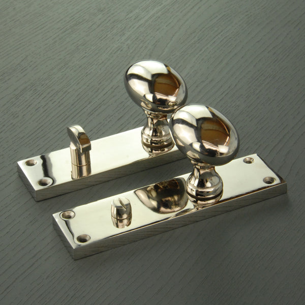 New York Door Knobs Oval Round Handles on Backplate Polished Nickel