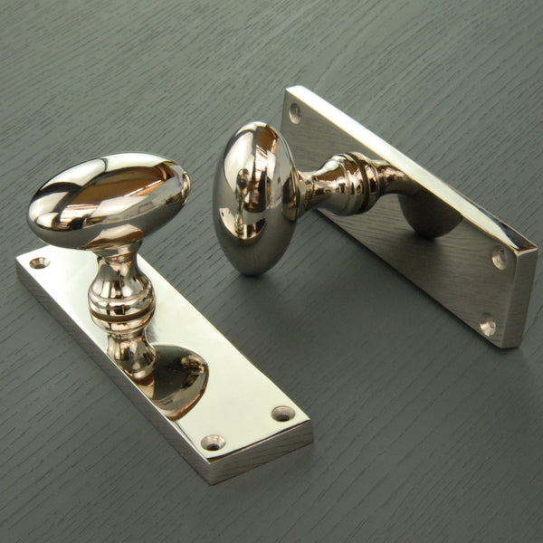 New York Door Knobs Oval Round Handles on Backplate Polished Nickel