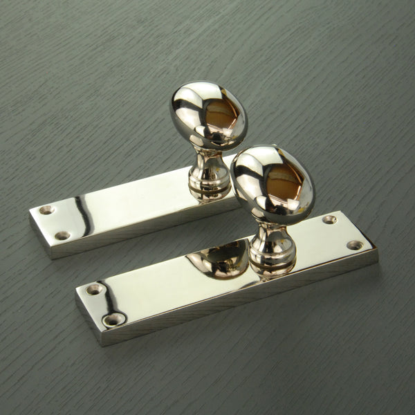 New York Door Knobs Oval Round Handles on Backplate Polished Nickel