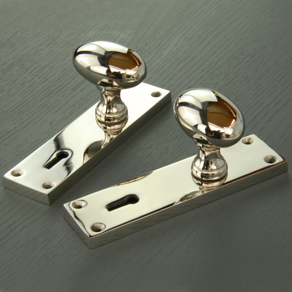 New York Door Knobs Oval Round Handles on Backplate Polished Nickel