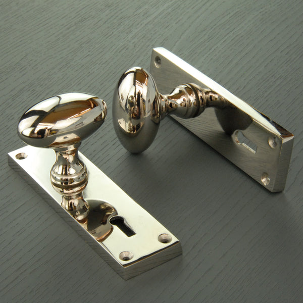 New York Door Knobs Oval Round Handles on Backplate Polished Nickel