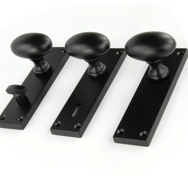 New York Door Knobs Oval Round Handles on Backplate Satin Black