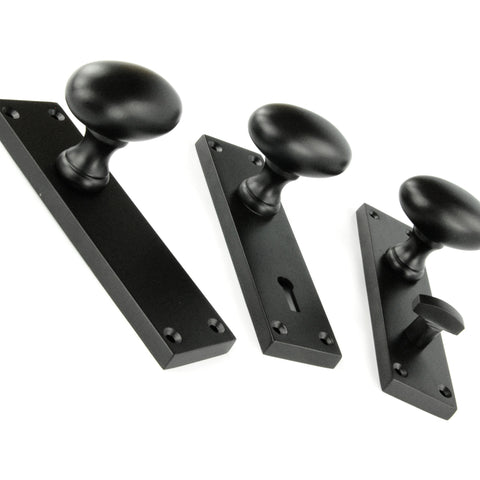 New York Door Knobs Oval Round Handles on Backplate Satin Black