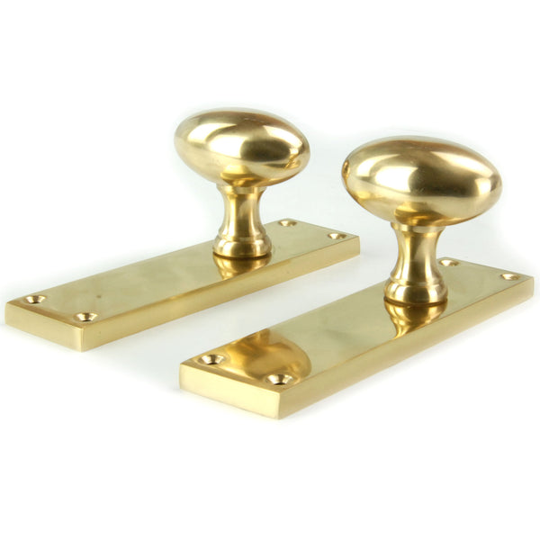 New York Oval Solid Brass Door Knobs Handles on Backplate Polished