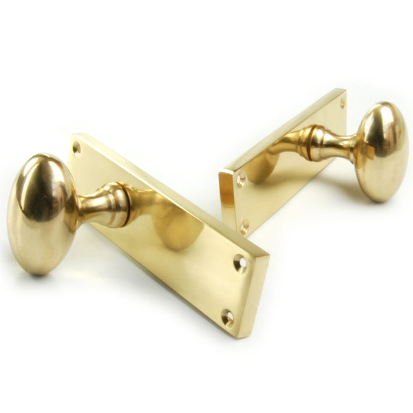 New York Oval Solid Brass Door Knobs Handles on Backplate Polished