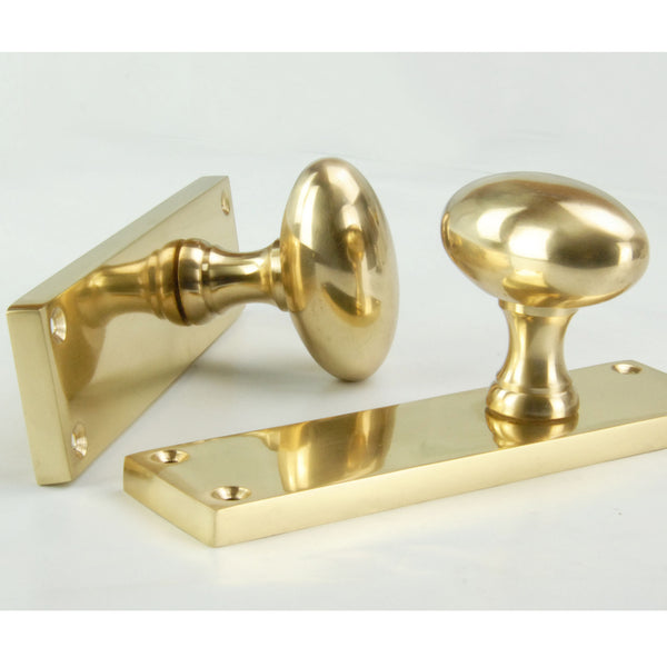 New York Oval Solid Brass Door Knobs Handles on Backplate Polished