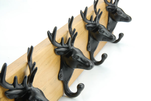 A Vintage Style Chunky Wooden Coat Rack 4 Cast Iron Stags Head Hooks