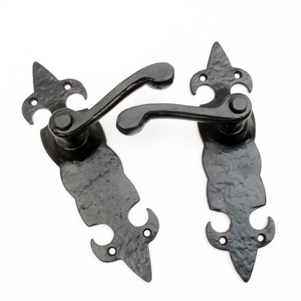 A Pair of Vintage Fleur de Lys Style Black Lever Latch Door Handles on Sprung Backplate