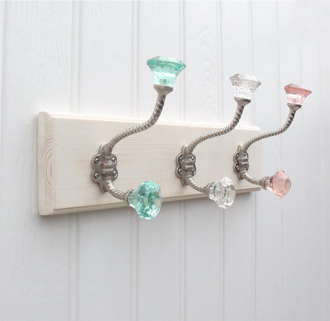 A Vintage Style Wooden Wall Storage Hook Rack with Pink , Green & Clear Glass Hooks