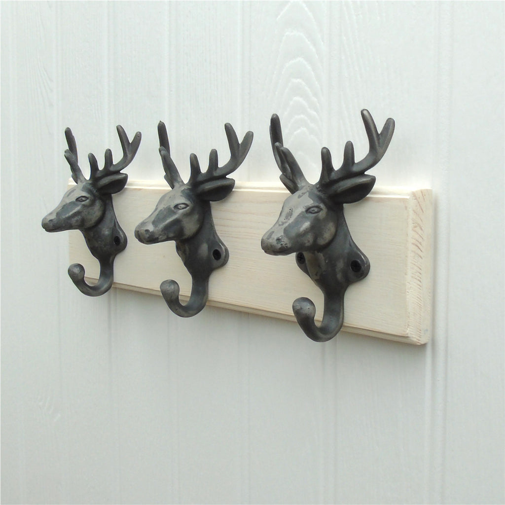 A Vintage Style Wooden Wall Storage Hook Coat Rack with 3 Cast Iron STAGS HEAD Hooks