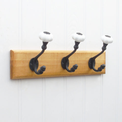 A Vintage Style Wooden Wall Hook Rack with Cast Iron / Ceramic Hooks