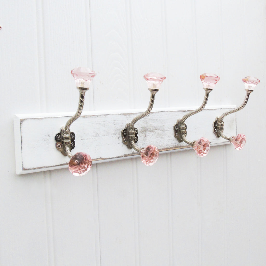A Shabby Chic Wooden Coat Hook Rack with 4 Pink Glass Hooks