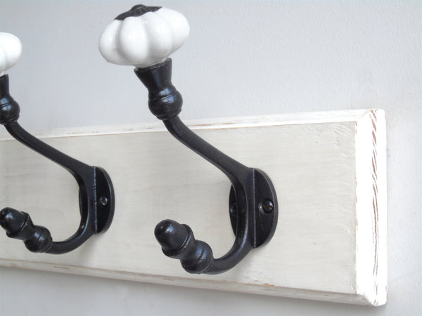 A Vintage White Painted Wooden Wall Door Storage Coat Rack  - Cast Iron Hook with Ceramic Hooks