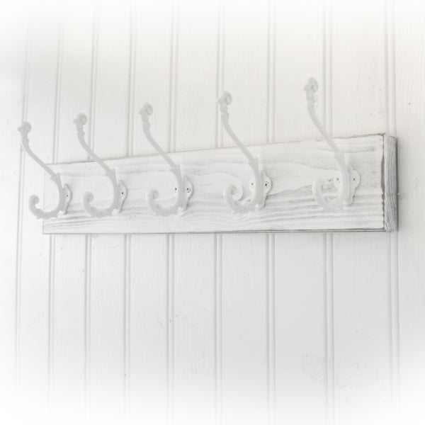 Distressed Coat Racks A Distressed White Wooden Coat Rack with 5 Cast Iron Ornate Hooks ...