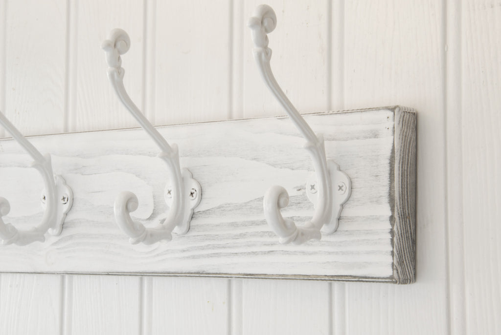 Distressed Coat Racks A Distressed White Wooden Coat Rack with 5 Cast Iron Ornate Hooks ...
