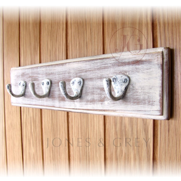A Vintage Style Wooden Wall Hook Rack with 4 single Cast Iron Hooks