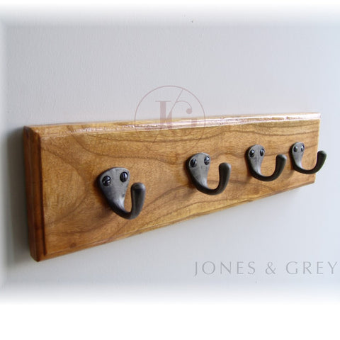 A Vintage Style Wooden Wall Hook Rack with 4 single Cast Iron Hooks